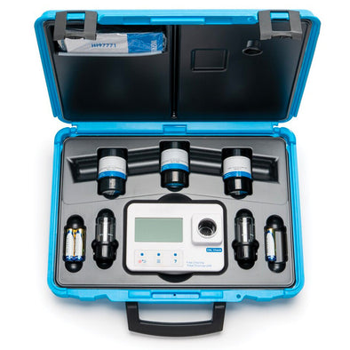 Portable pressure testing kit with digital display in a blue case on a white background