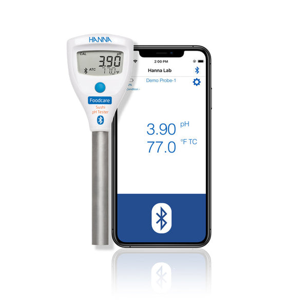 Hanna pH meter and smartphone displaying pH and temperature readings on a white background